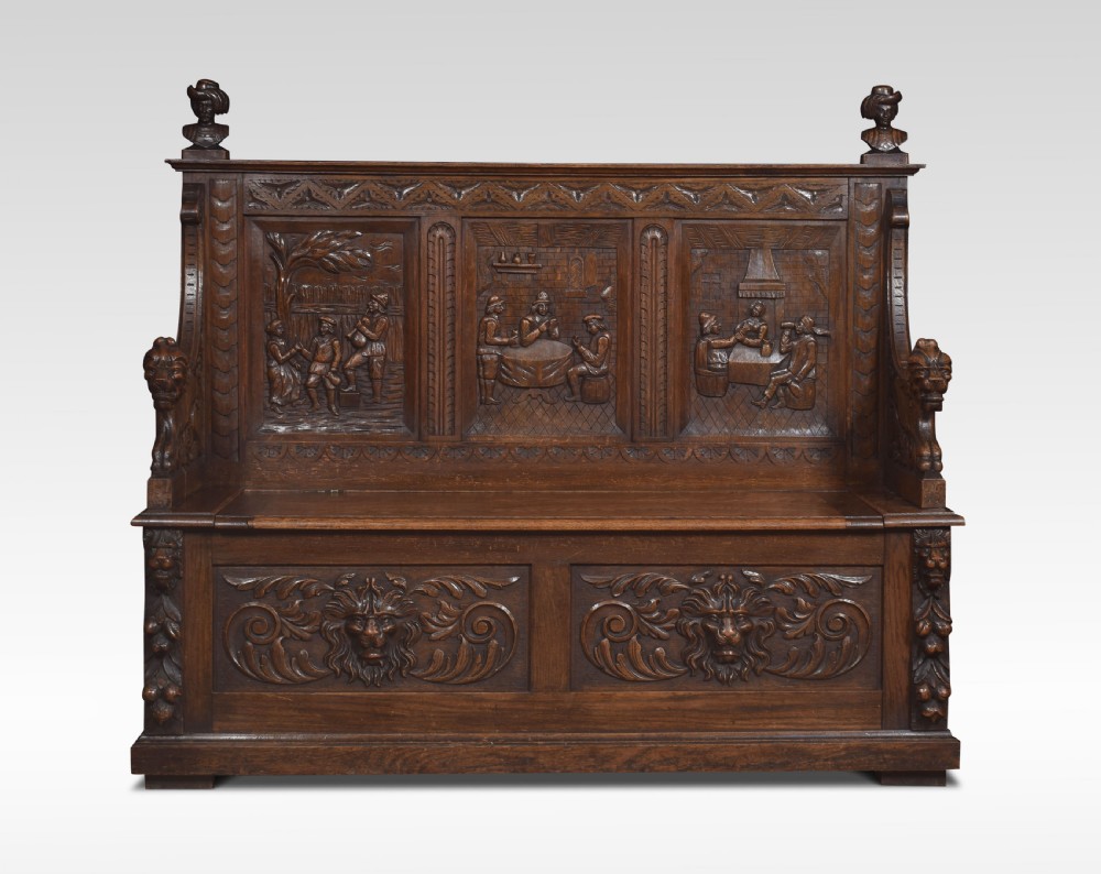 Carved oak hall settle View II