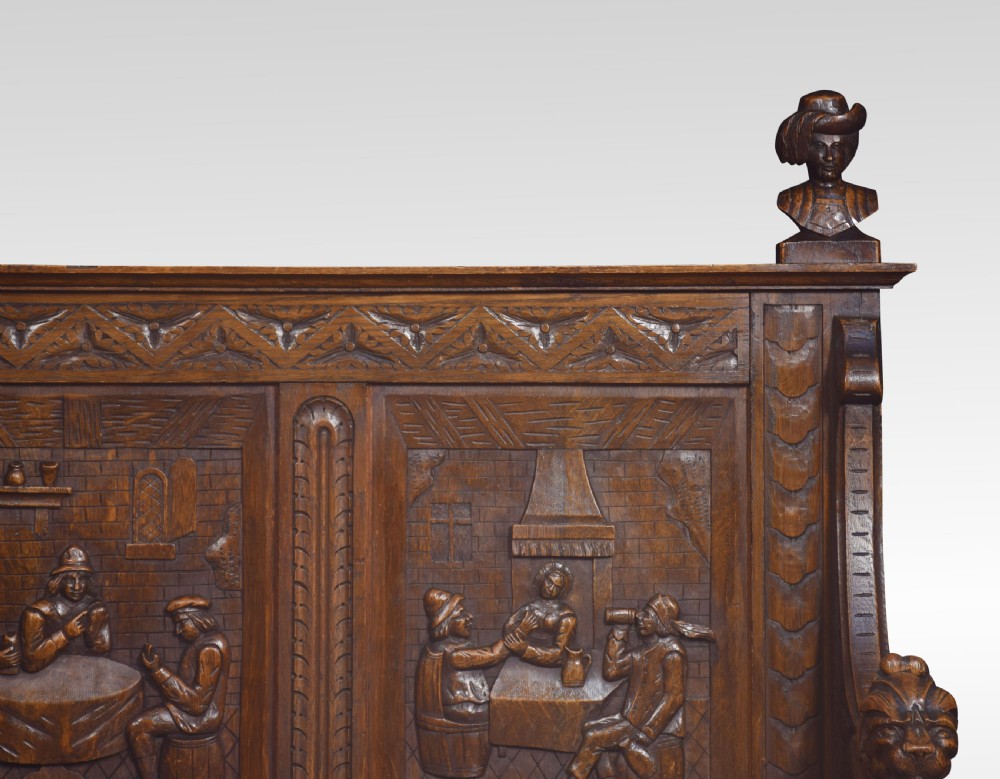 Carved oak hall settle View IV
