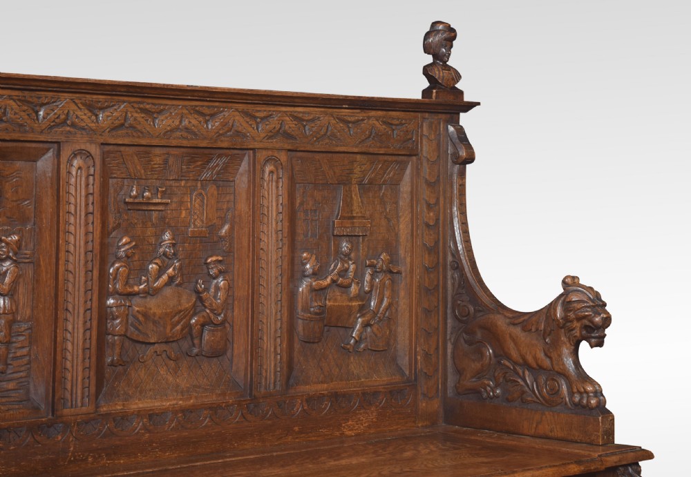 Carved oak hall settle View VI