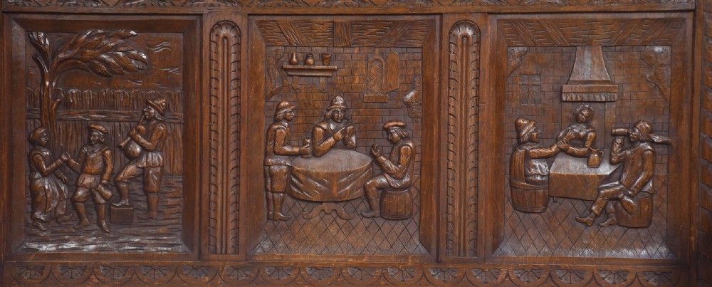Carved oak hall settle View VII