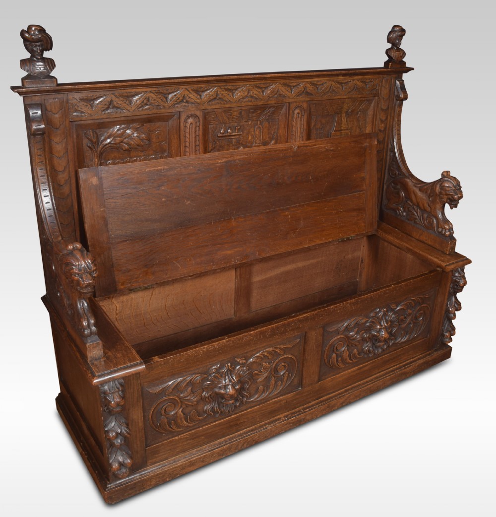 Carved oak hall settle View VIII