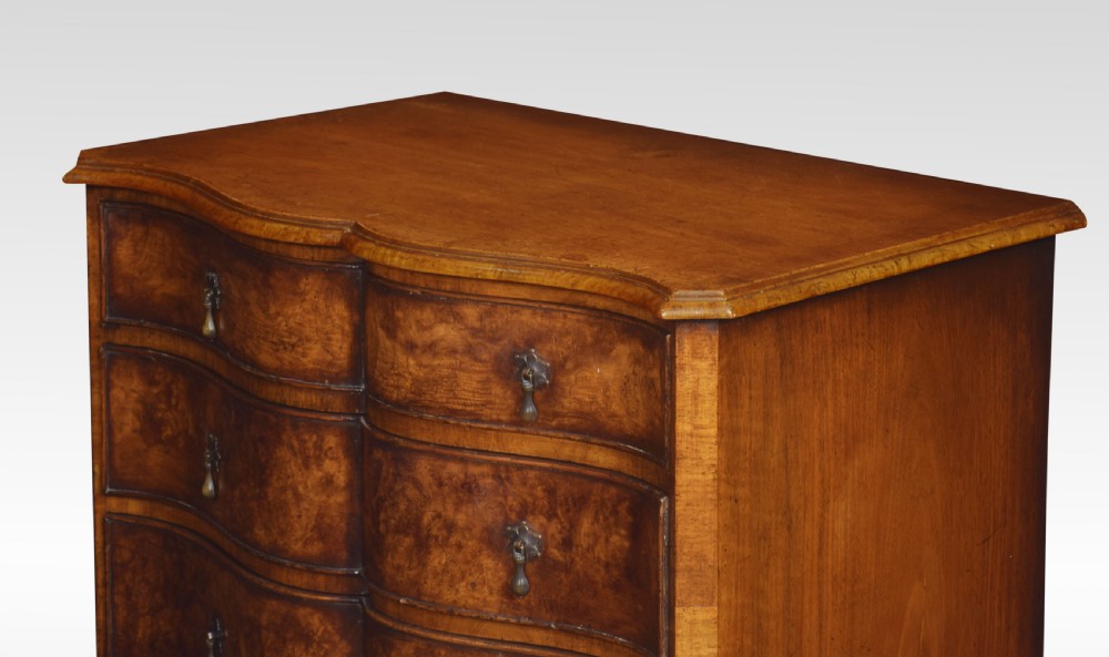 Figured walnut serpentine fronted chest of drawers View IV