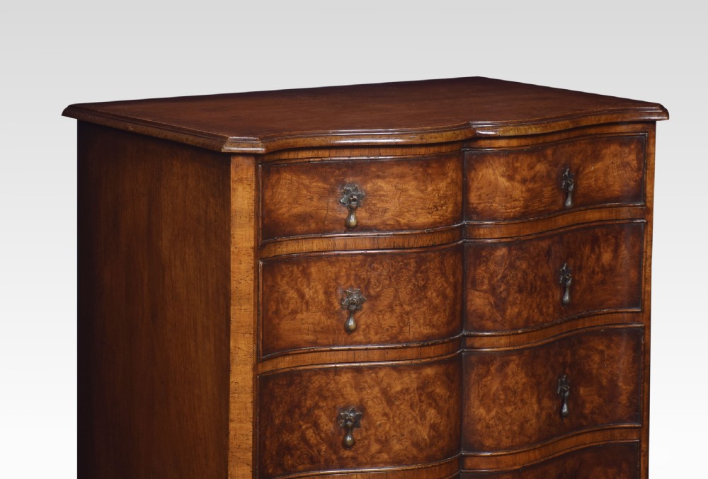 Figured walnut serpentine fronted chest of drawers View VII