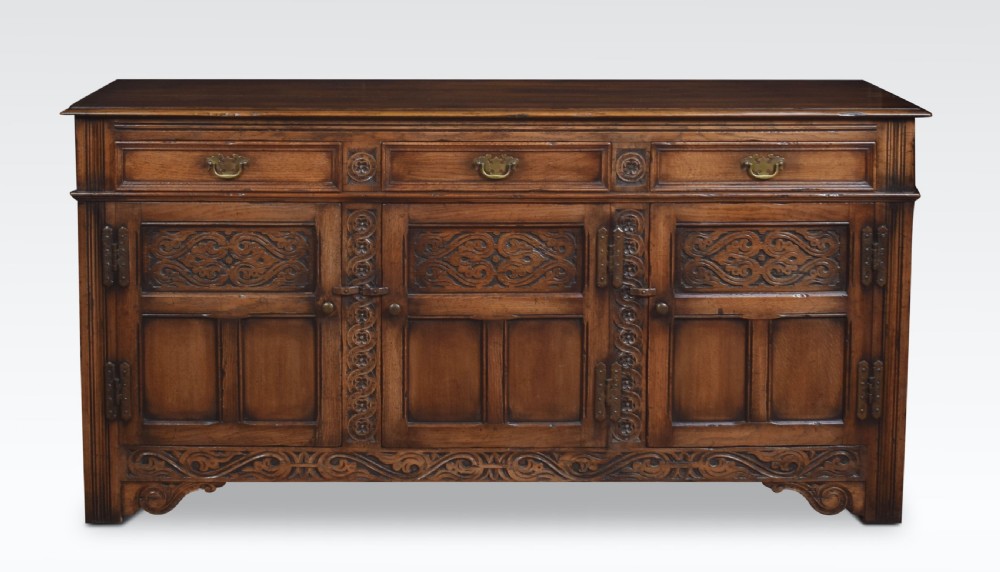 Jacobean style oak three drawer dresser base