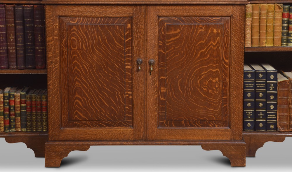 Very large oak dwarf breakfront bookcase View II