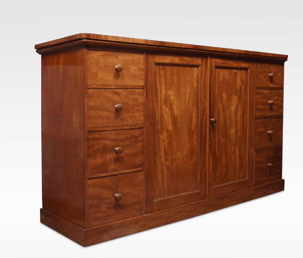 Mahogany low linen press by Holland and Sons View III