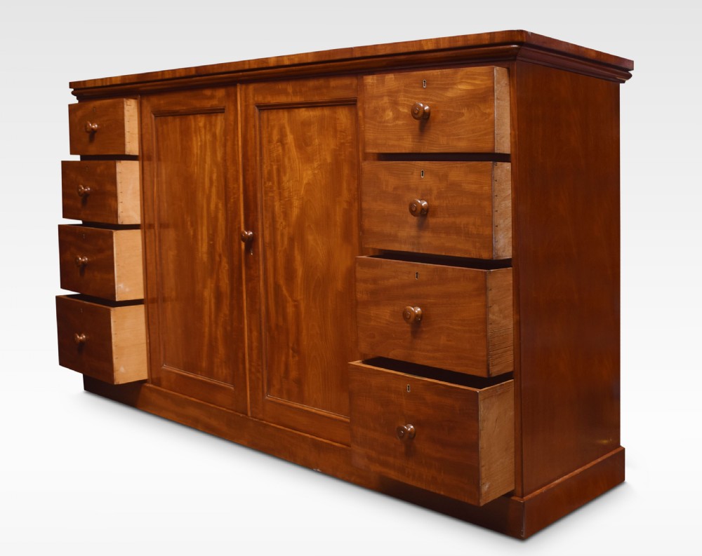 Mahogany low linen press by Holland and Sons View IV