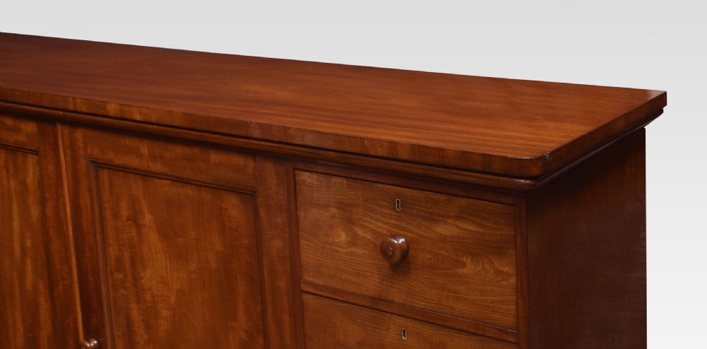 Mahogany low linen press by Holland and Sons View IX