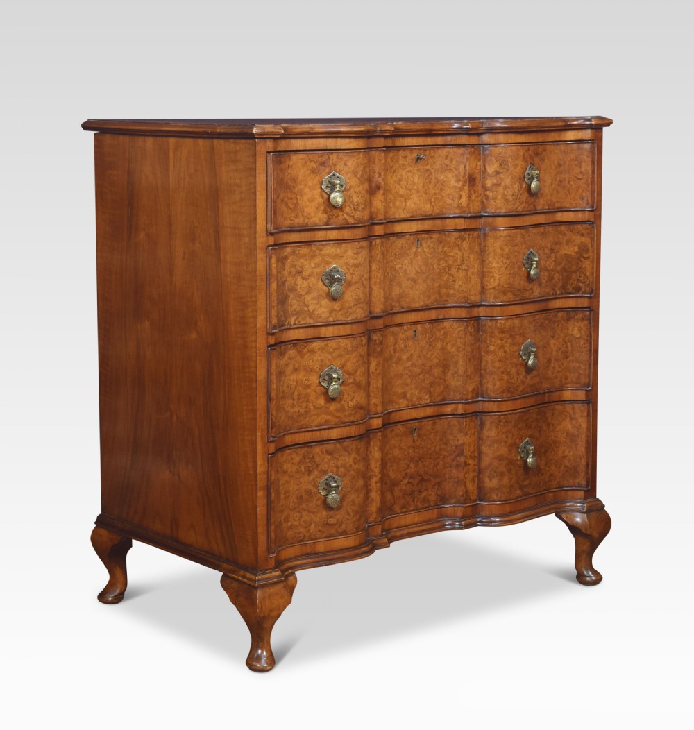 Figured walnut serpentine fronted chest of drawers View VI