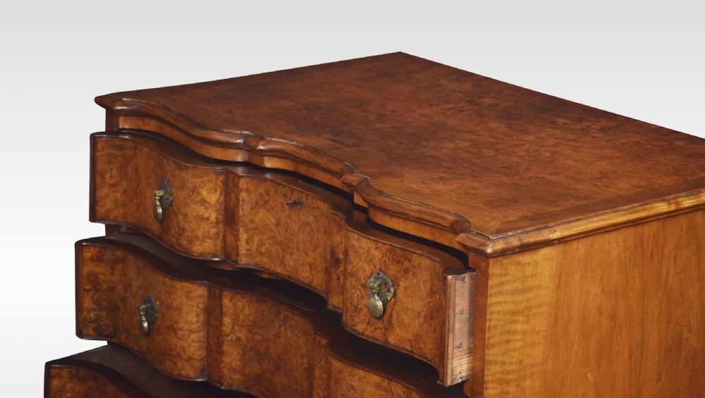Figured walnut serpentine fronted chest of drawers View VIII