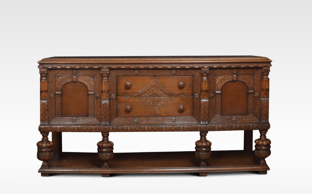 Carved oak sideboard