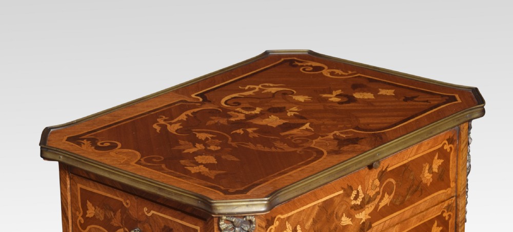 Pair of marquetry inlaid and gilt metal mounted bedside chests View II