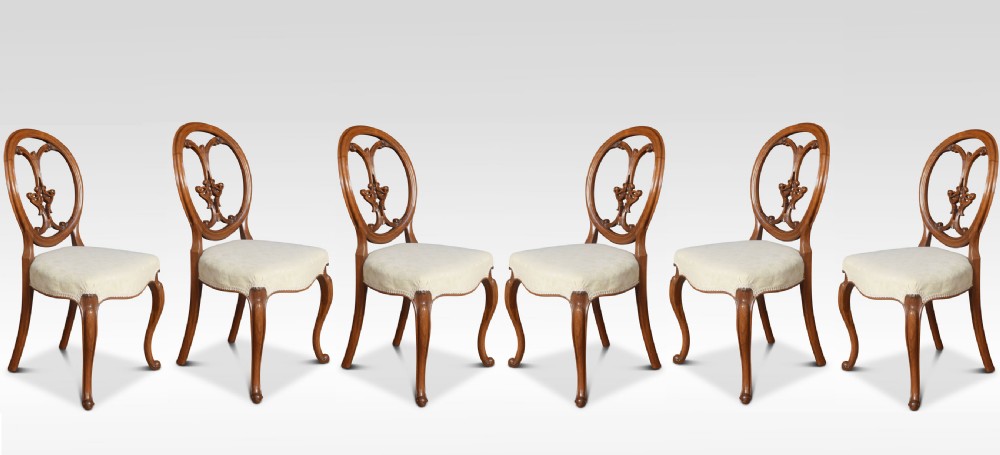 Set of six walnut dining room chairs