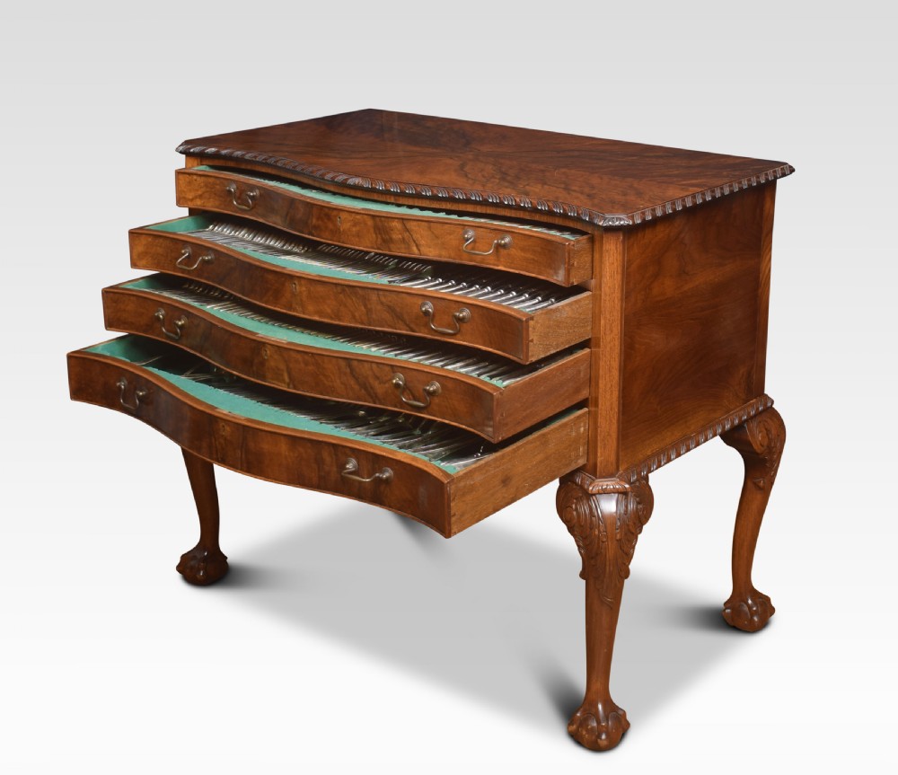 Walnut serpentine fronted canteen of cutlery