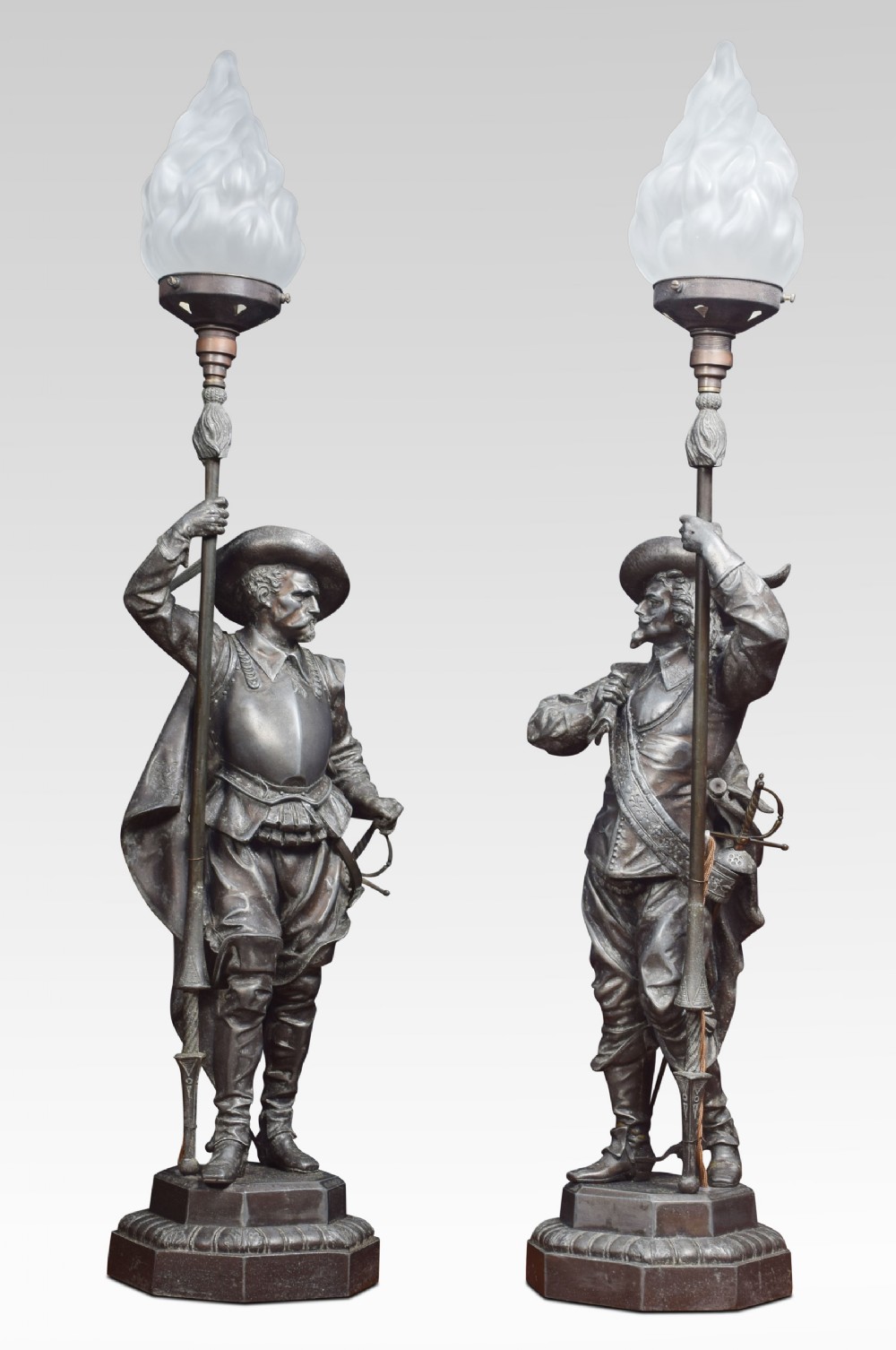  Pair of French renaissance soldiers holding a lamps