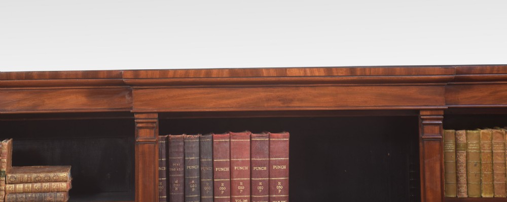 Large mahogany breakfront open bookcases View II