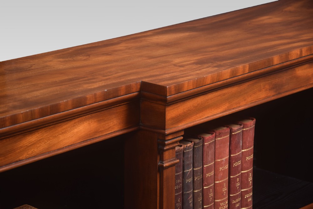 Large mahogany breakfront open bookcases View VII