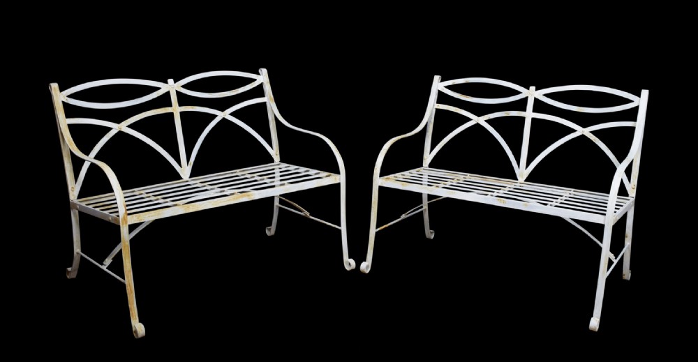 Pair of regency style white painted metal garden benches