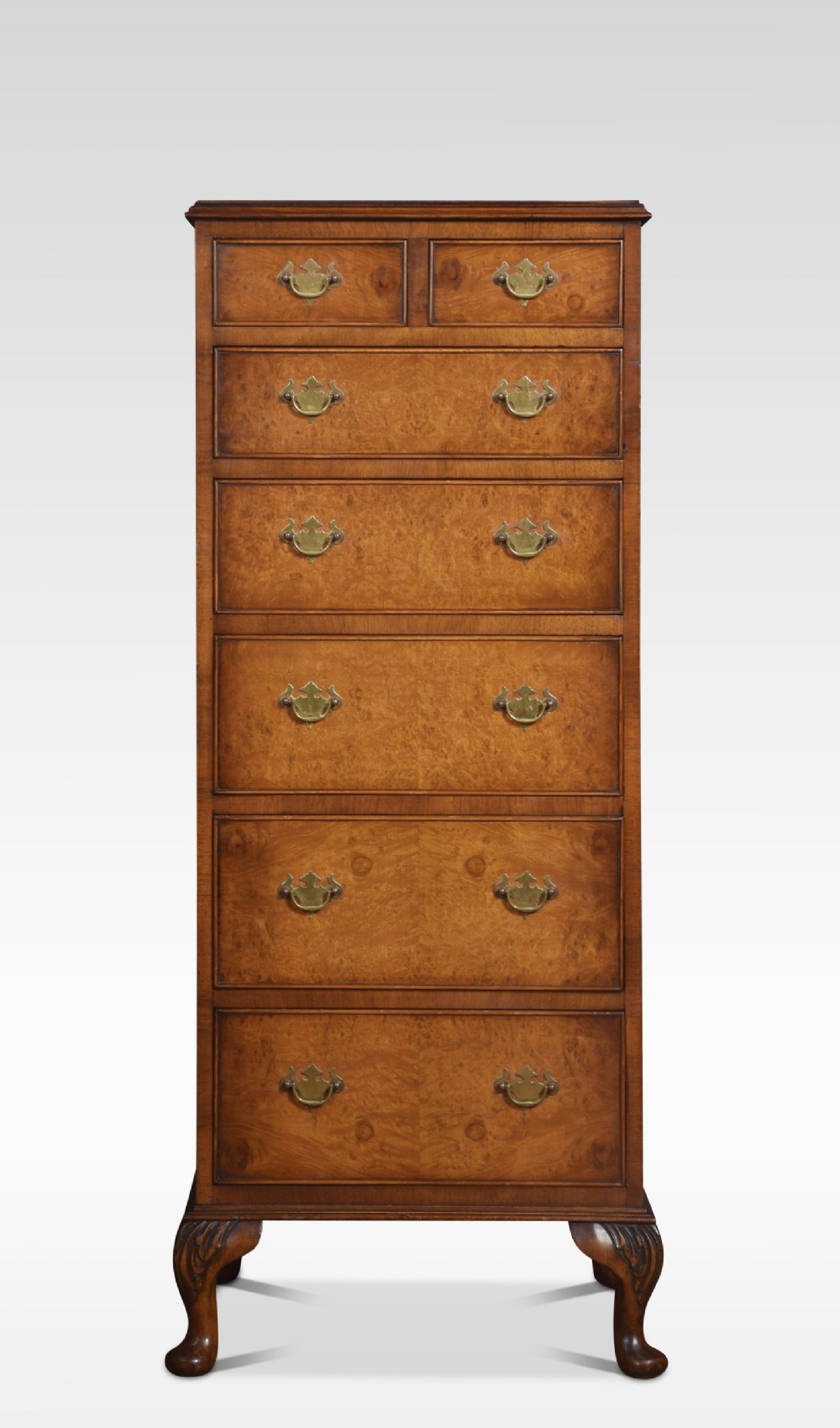Walnut tall chest of drawers