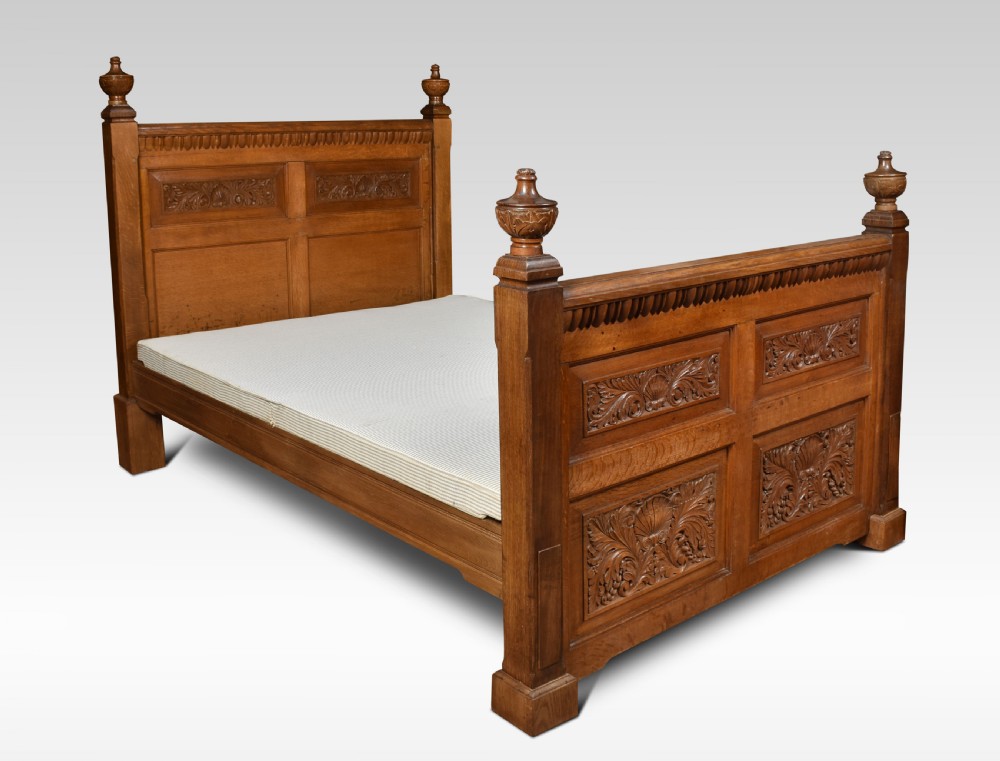 Carved oak double bed