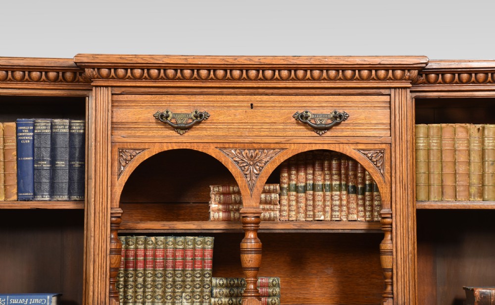 Reformed Gothic golden oak open bookcase View II
