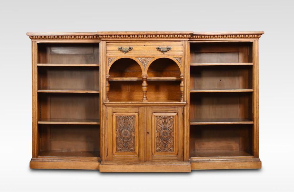 Reformed Gothic golden oak open bookcase View III