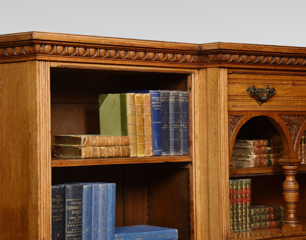 Reformed Gothic golden oak open bookcase View V