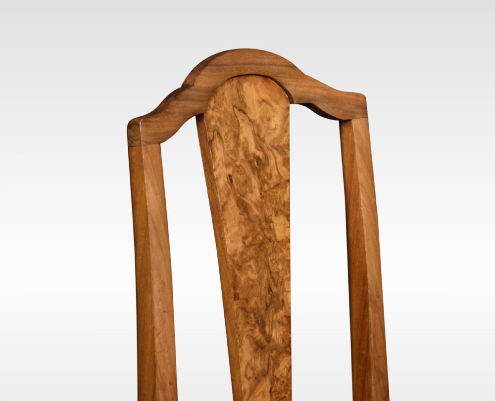 A pair of antique walnut side chairs featuring high backs with central burr walnut splats, floral upholstered seats, and curved cabriole legs. View II