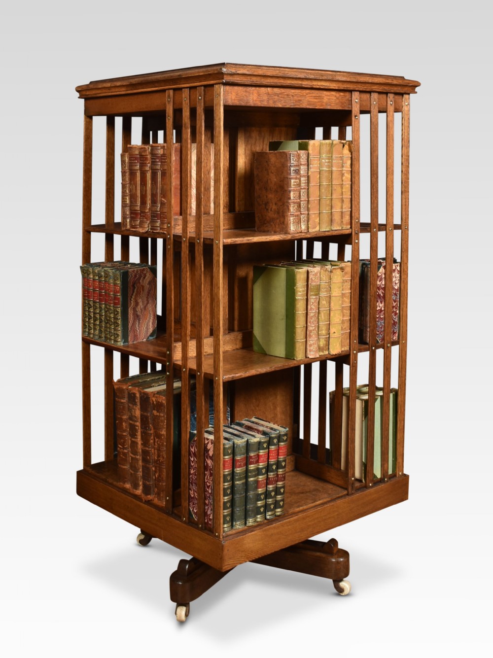 Oak three tier revolving bookcase