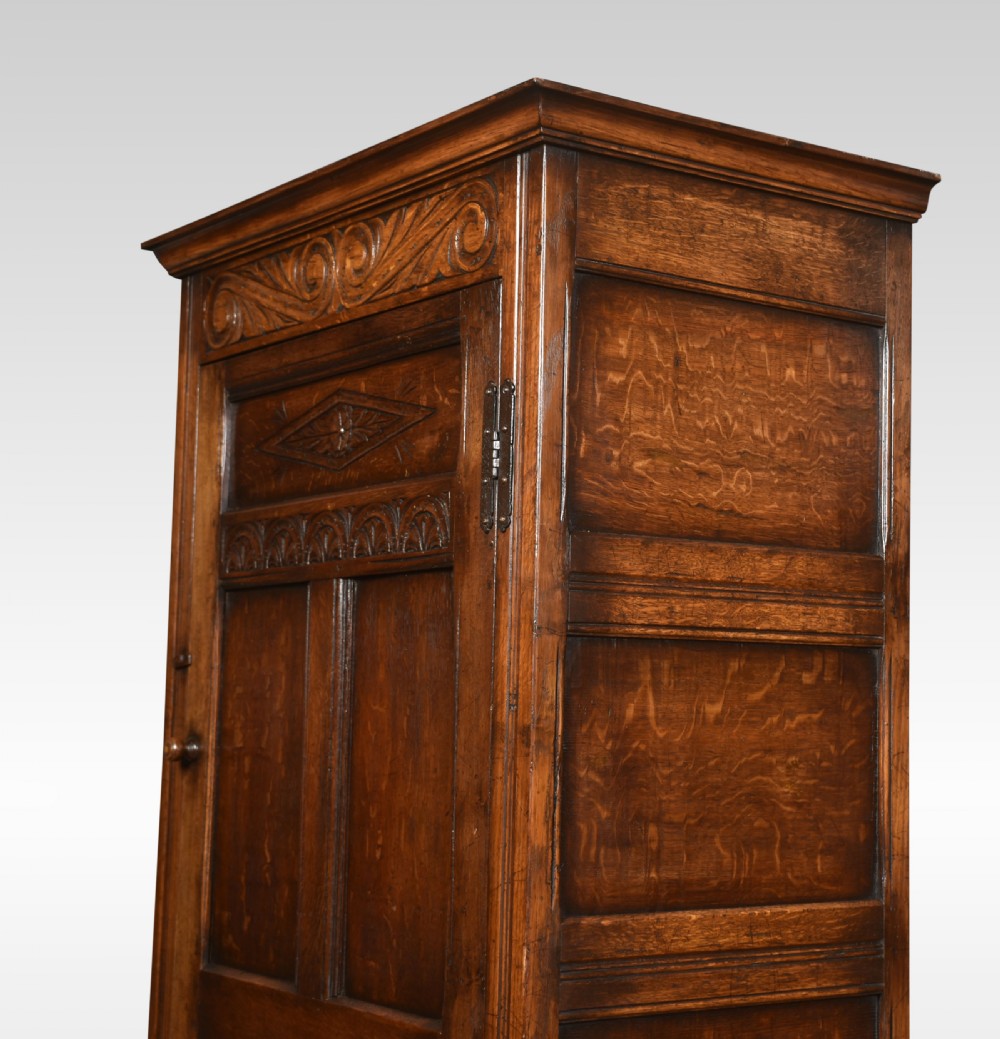 Carved oak hall robe View X