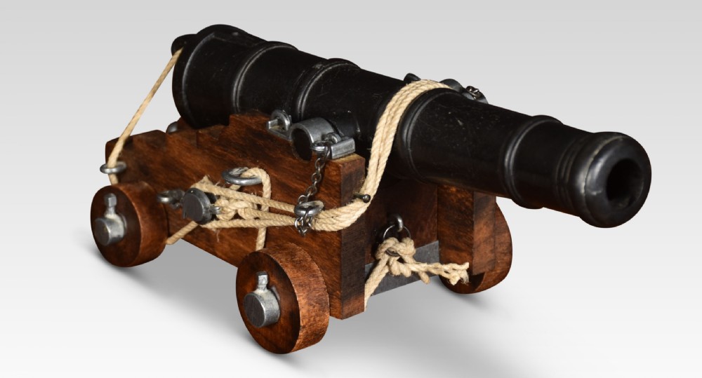 Large desk top model of a cast iron signal cannon View III
