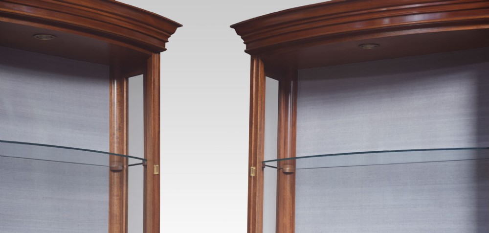 Pair of mahogany bow fronted display cabinets View V