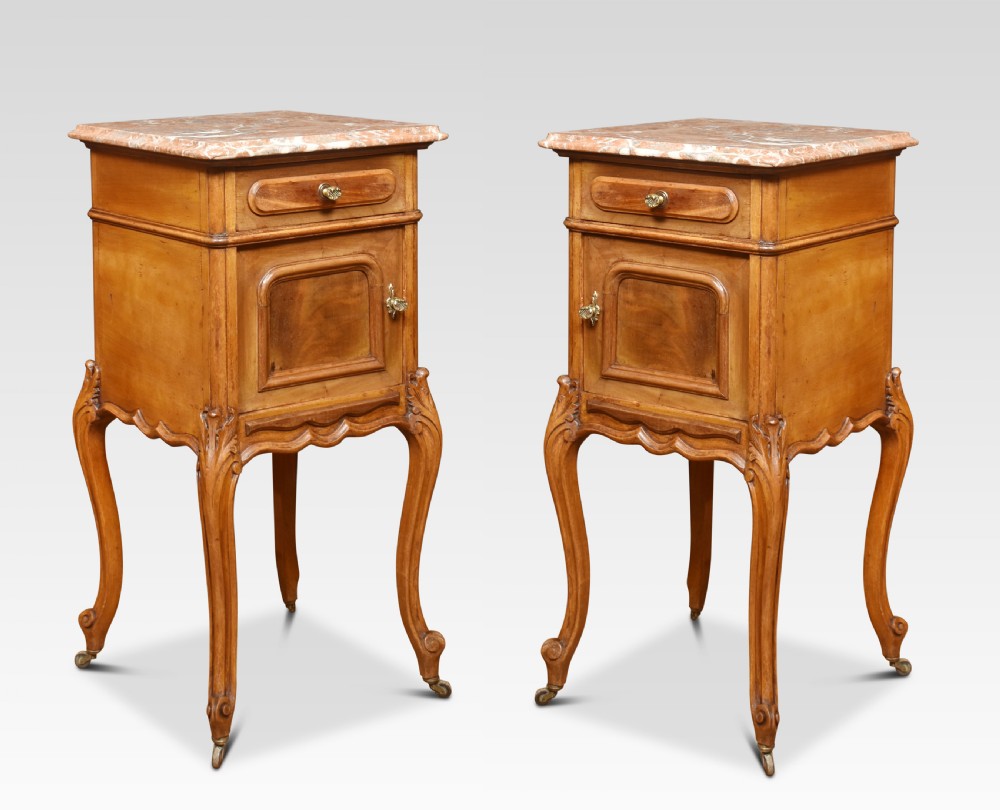 Pair of walnut marble top bedside cabinets