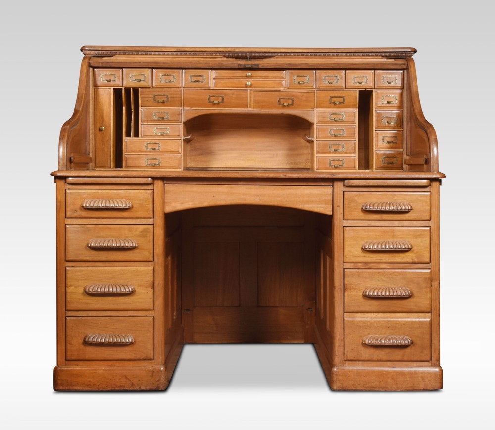 Walnut pedestal roll top desk
