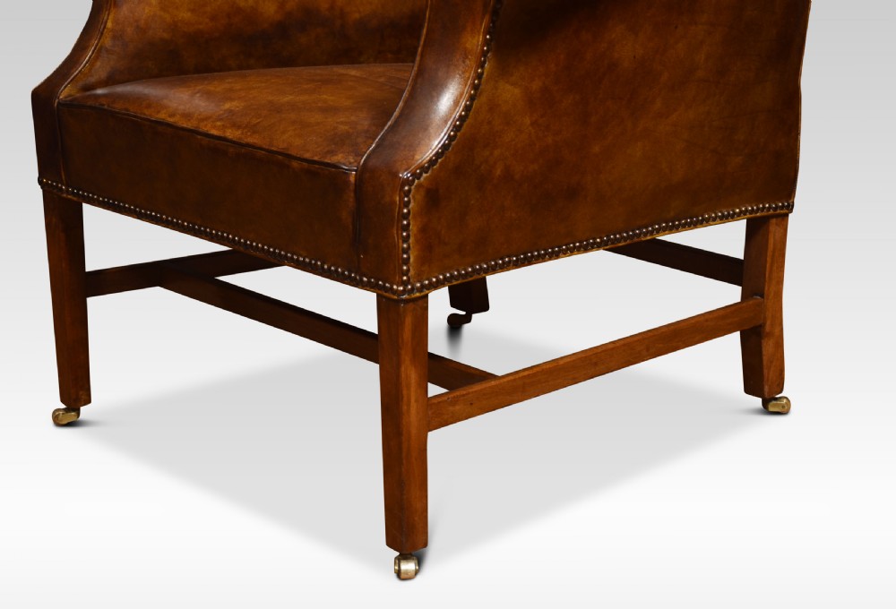 Brown leather upholstered wingback armchair View III