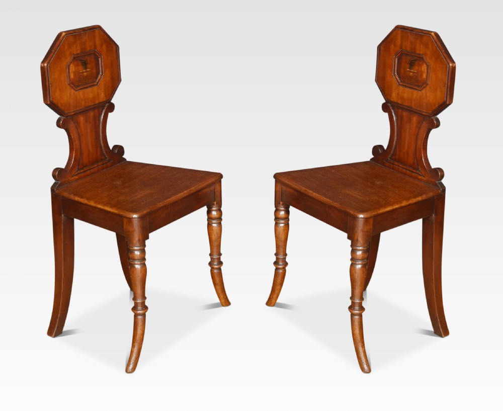 Pair of mahogany hall chairs