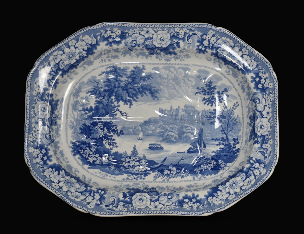 A 19th-century Staffordshire deep rectangular dish featuring cobalt blue transfer-printed floral borders and a central river landscape scene. View VI