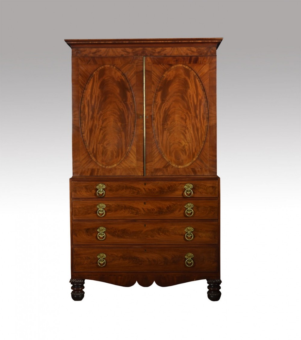19th century flame mahogany press cupboard