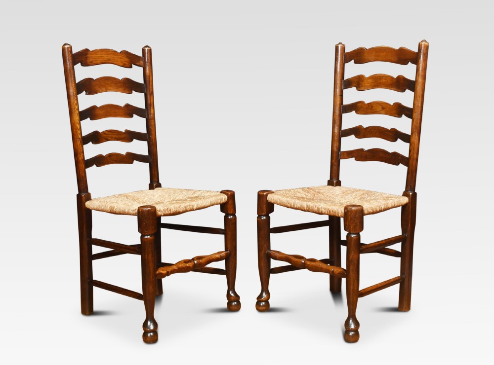 Set of six oak ladder back dining chairs View II
