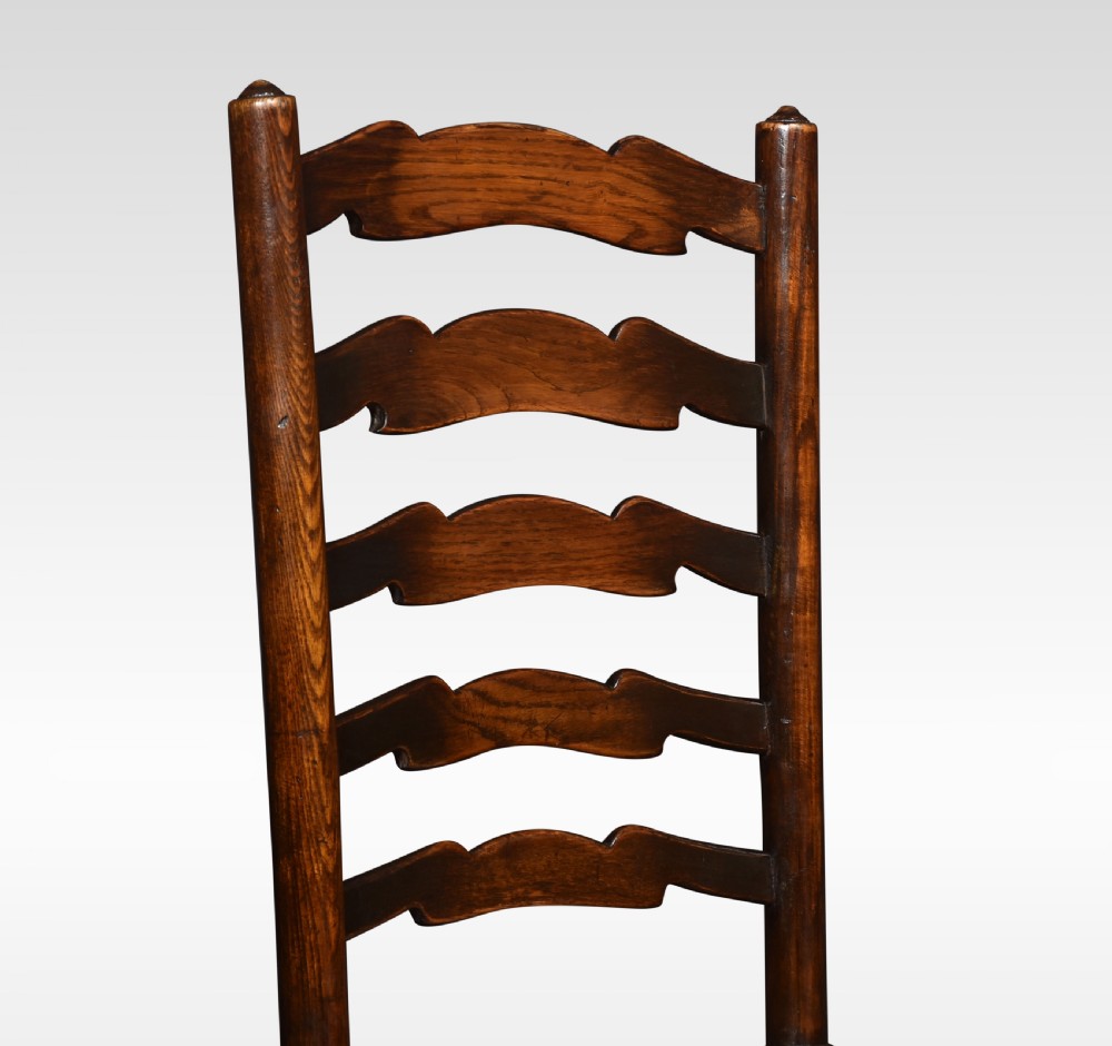 Set of six oak ladder back dining chairs View III