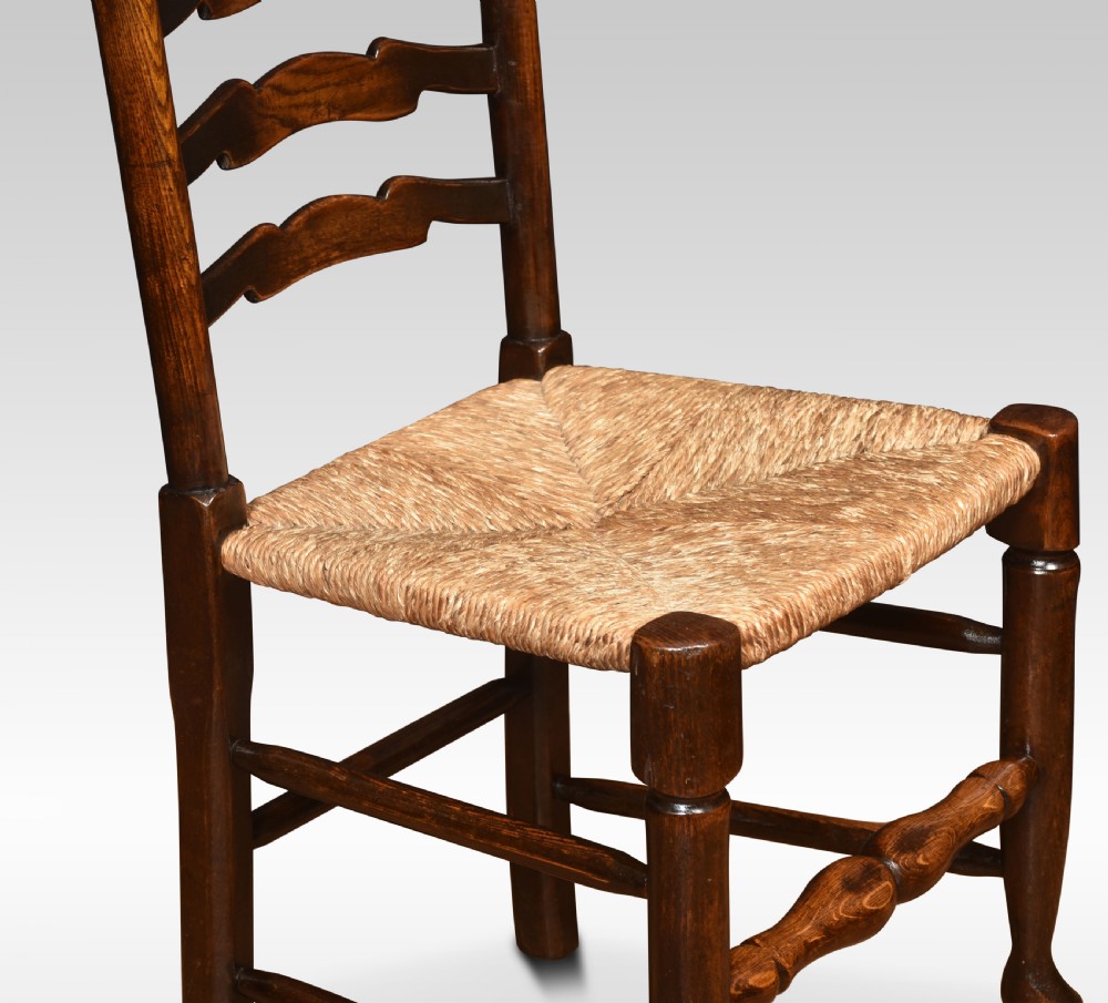 Set of six oak ladder back dining chairs View IV