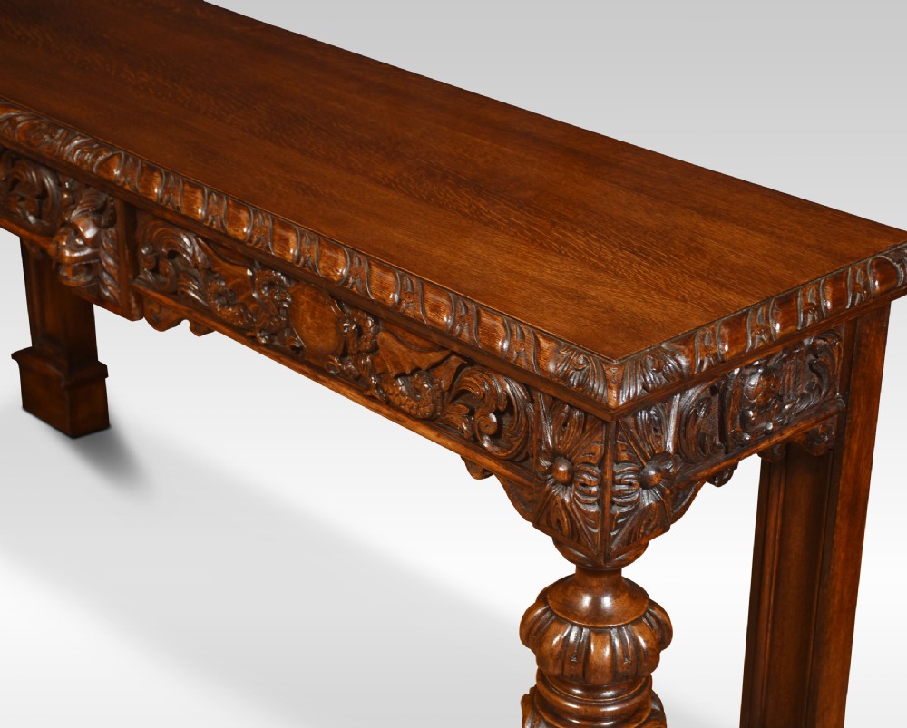 Large carved oak console table View IX