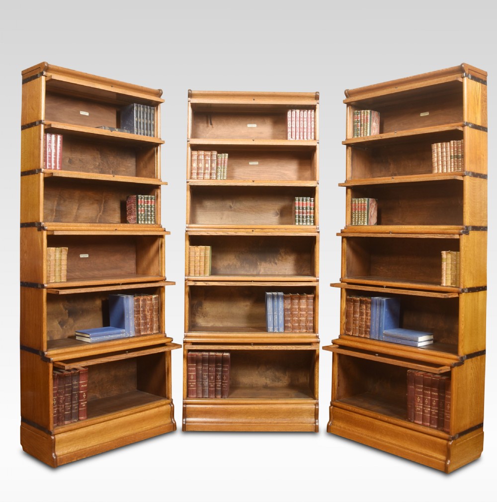 Set of three oak globe Wernicke six section bookcases View V