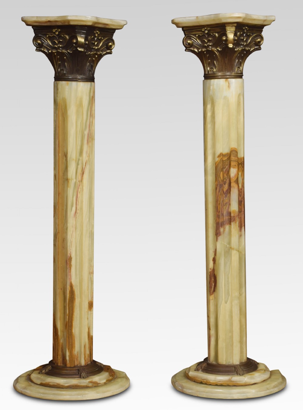 Pair of onyx and gilt-metal-mounted pedestals