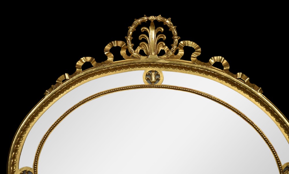Gilt oval wall mirror View II