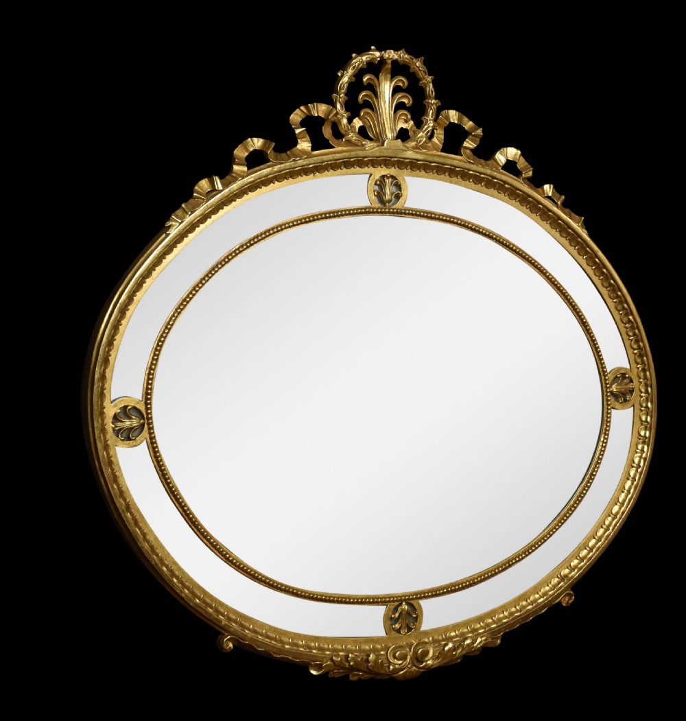 Gilt oval wall mirror View VI