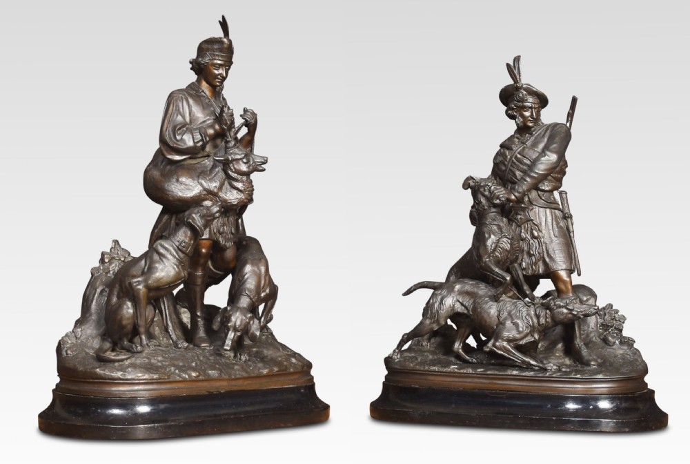 Pair of spelter hunting figures