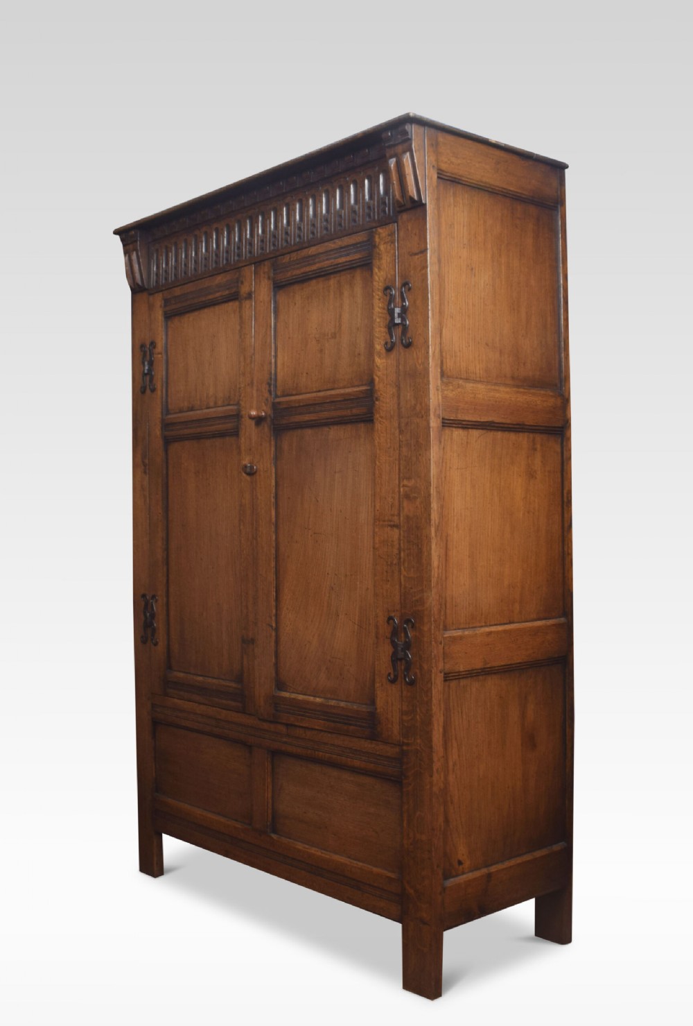 Carved oak hall robe