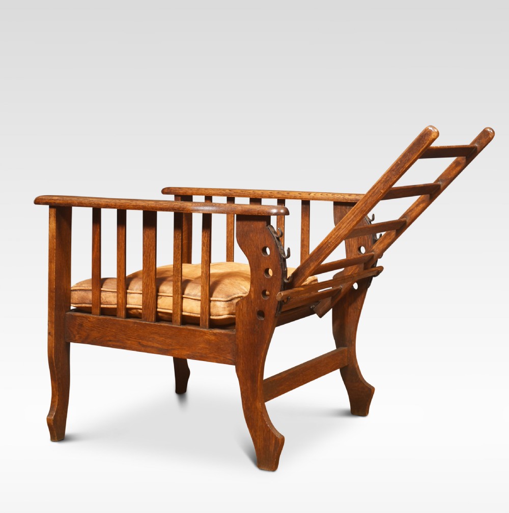 Pair of oak reclining armchairs View III