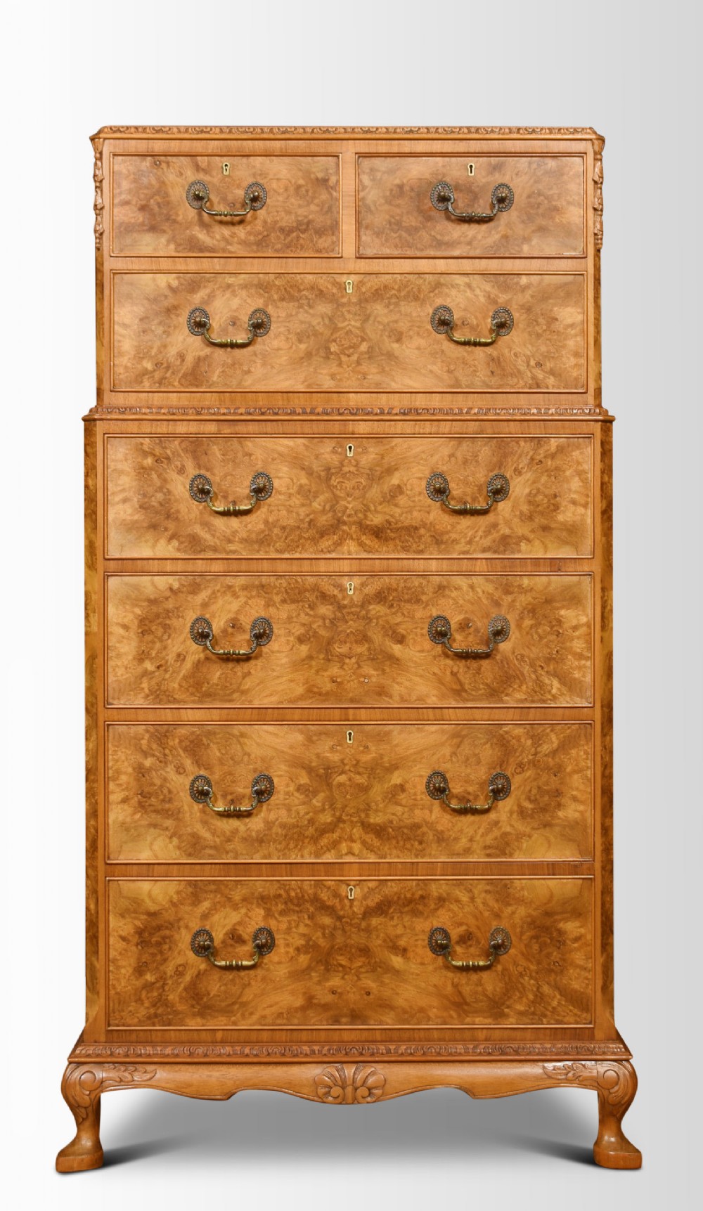 Tall walnut chest of drawers